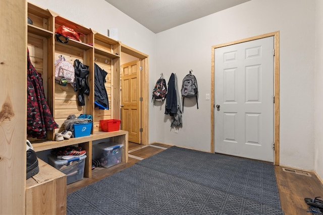 mudroom with dark hardwood / wood-style floors