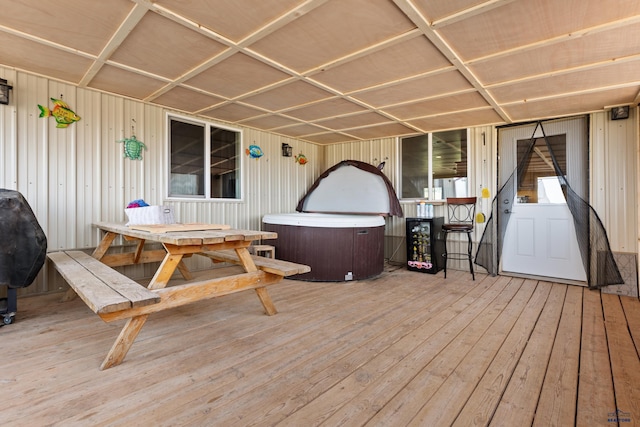 wooden deck with a grill