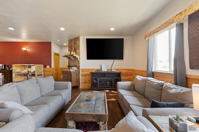 living room featuring dark hardwood / wood-style floors