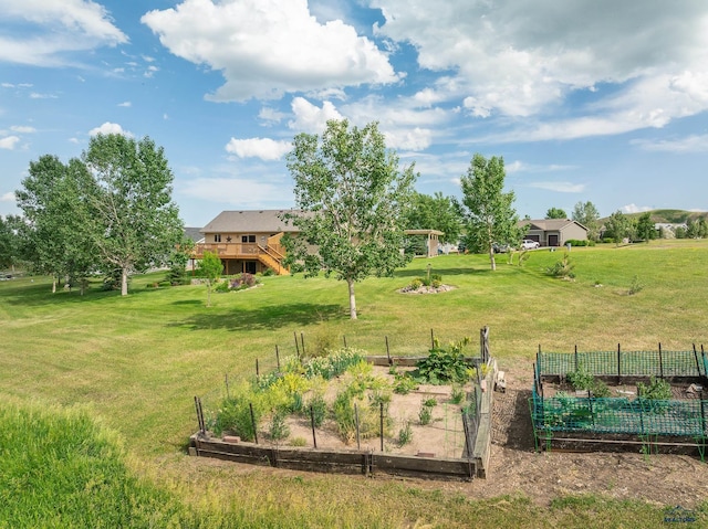 view of yard featuring a wooden deck