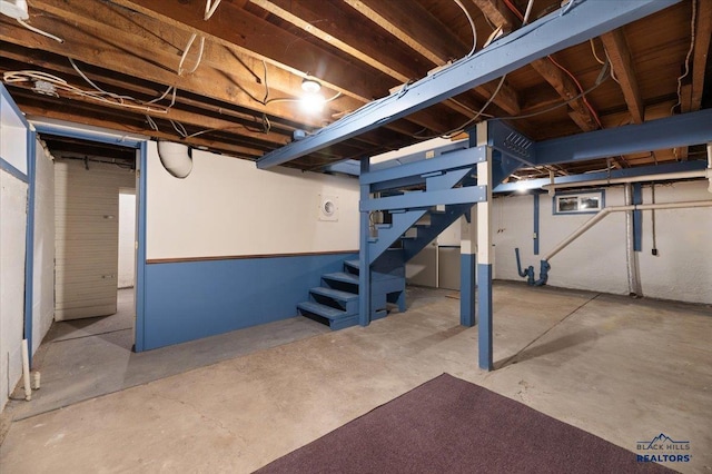 914 Kingsbury St, Belle Fourche, SD 57717 - unfinished basement featuring stairs