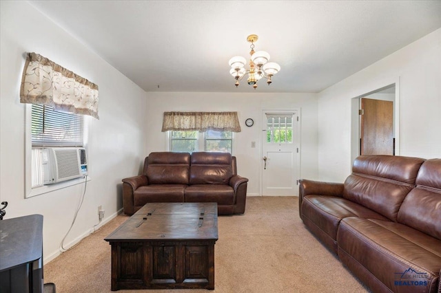 living room with cooling unit, light colored carpet, and a notable chandelier