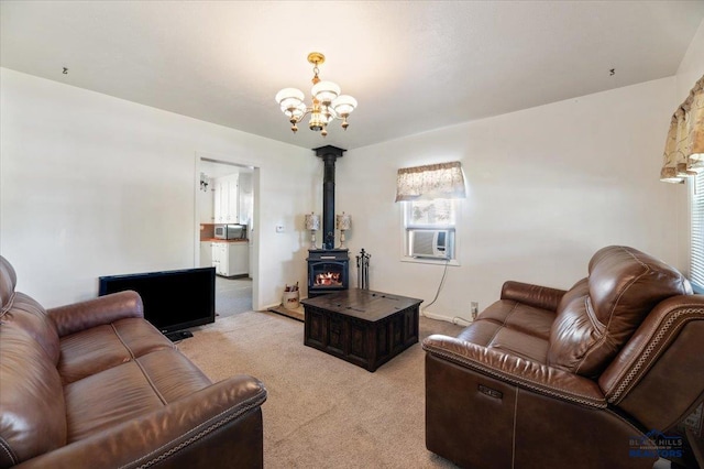 living room featuring light carpet, cooling unit, a chandelier, and a wood stove