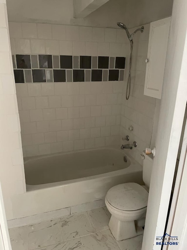 1022 Blaine Ave, Rapid City, SD 57701 - full bath with toilet, marble finish floor, and washtub / shower combination