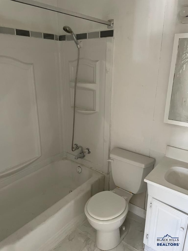 1022 Blaine Ave, Rapid City, SD 57701 - full bathroom with shower / washtub combination, marble finish floor, toilet, and vanity