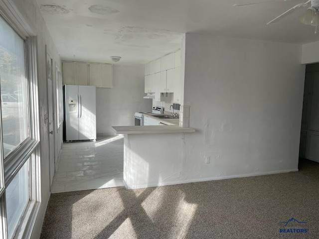 1022 Blaine Ave, Rapid City, SD 57701 - kitchen with white appliances, a sink, ceiling fan, light countertops, and white cabinetry