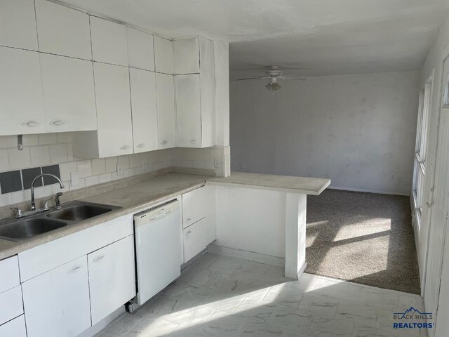 1022 Blaine Ave, Rapid City, SD 57701 - kitchen with marble finish floor, a ceiling fan, a sink, white cabinets, and white dishwasher