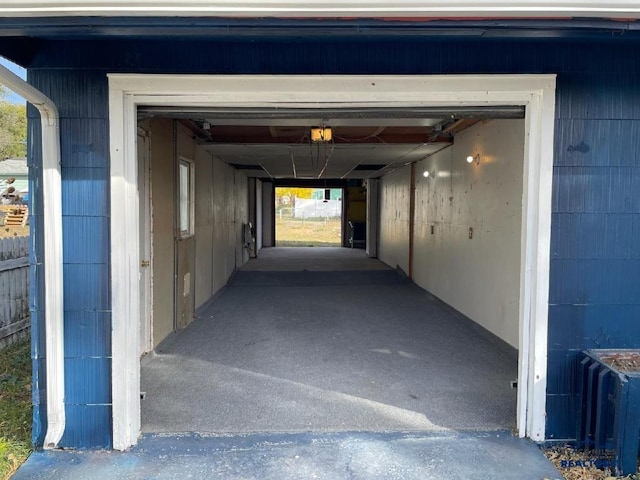 1022 Blaine Ave, Rapid City, SD 57701 - garage featuring a garage door opener