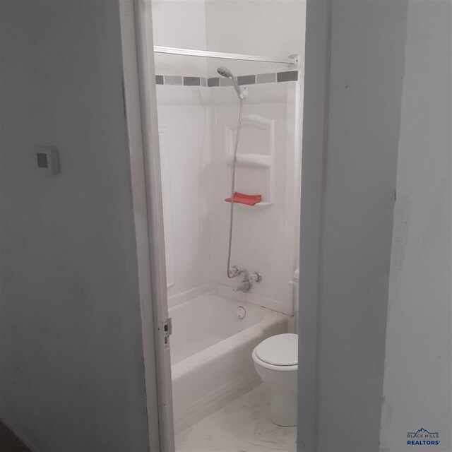 1022 Blaine Ave, Rapid City, SD 57701 - full bath with toilet, marble finish floor, and bathtub / shower combination