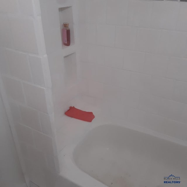 1022 Blaine Ave, Rapid City, SD 57701 - full bath with a tub and walk in shower