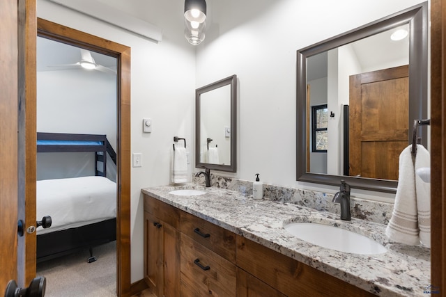 23974 Thompson Dr, Hill City, SD 57745 - bathroom with double vanity and ensuite bath
