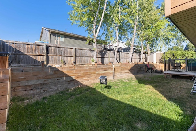 view of yard featuring a deck