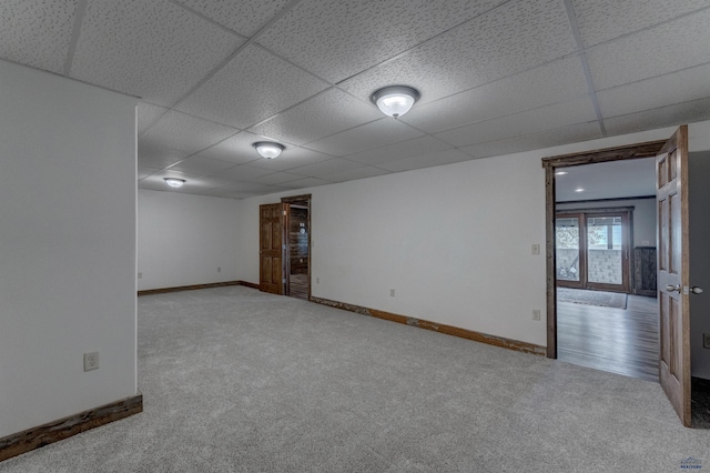 11845 N Haines Ave, Rapid City, SD 57701 - spare room with carpet flooring, baseboards, and a drop ceiling