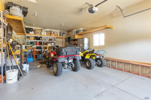 garage featuring a garage door opener