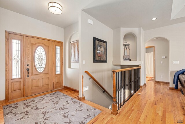 foyer featuring wood-type flooring