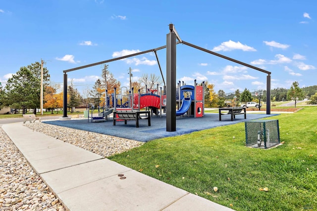 view of jungle gym with a lawn