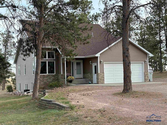 view of front of home with a garage