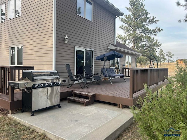 deck with area for grilling