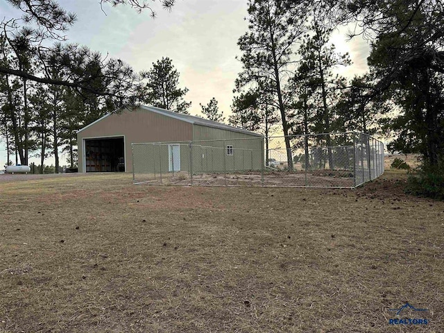 view of outdoor structure at dusk