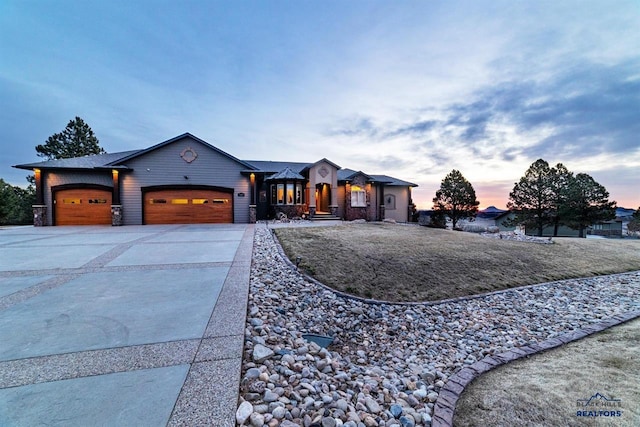 view of front of property with a garage