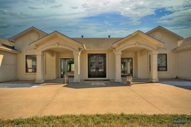 view of front facade featuring french doors