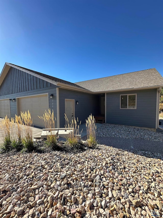 ranch-style home with a garage