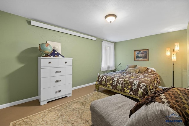 bedroom with baseboards
