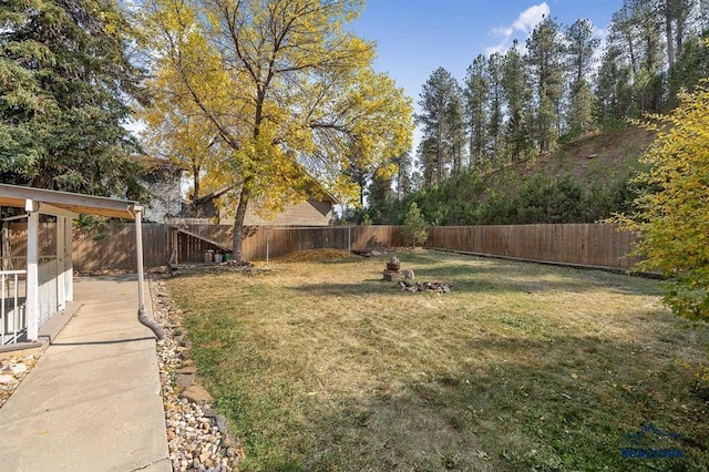 view of yard with a fenced backyard
