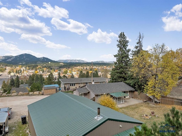 aerial view featuring a mountain view and a residential view