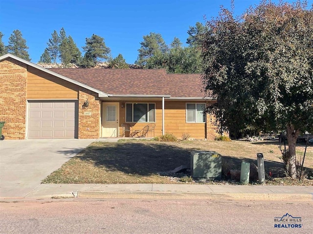 single story home featuring a garage