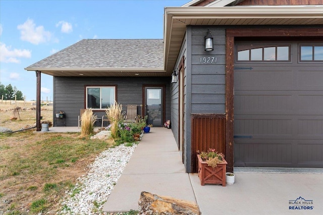 exterior space with a garage