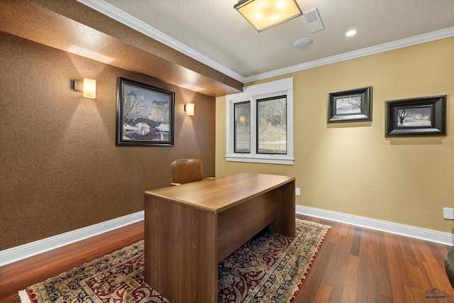 home office with dark wood-type flooring, ornamental molding, and a textured ceiling