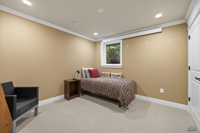 carpeted bedroom featuring ornamental molding