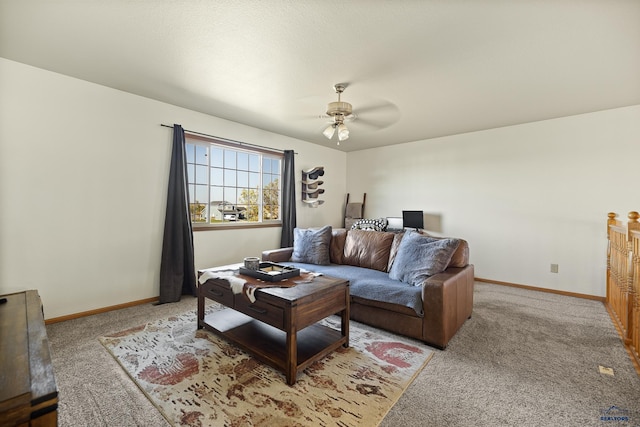 living room with carpet and ceiling fan