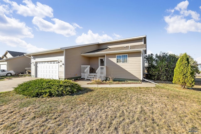 ranch-style house with a front yard and a garage