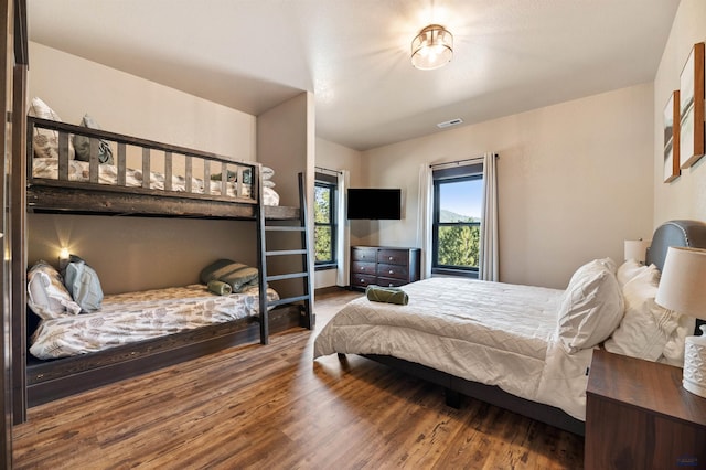 bedroom with hardwood / wood-style flooring