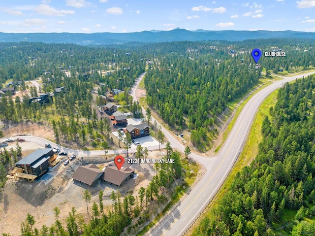 drone / aerial view featuring a mountain view