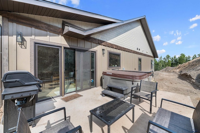 view of patio / terrace featuring a hot tub