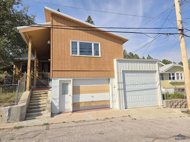 415 Spark St, Lead, SD 57754 - view of front of property featuring a garage and fence