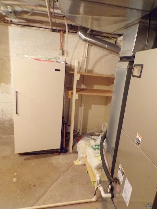415 Spark St, Lead, SD 57754 - utility room featuring heating unit