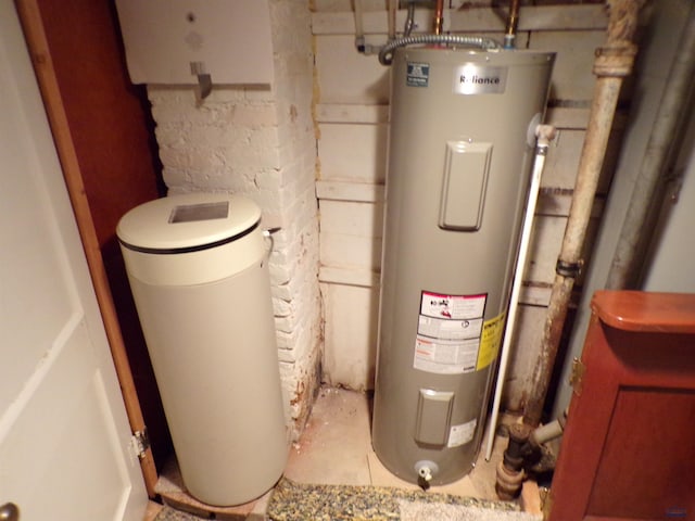 utility room featuring electric water heater