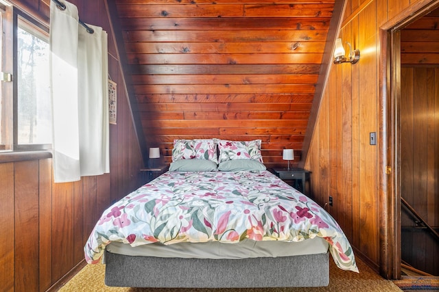 bedroom featuring wood ceiling, wood walls, carpet, and vaulted ceiling