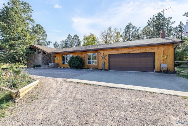 single story home featuring a garage