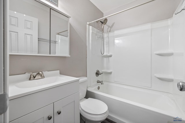 full bathroom with vanity, toilet, and shower / tub combination