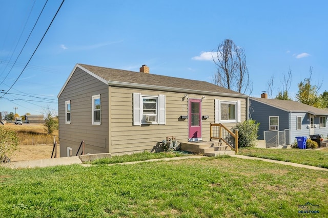 view of front of house with a front lawn