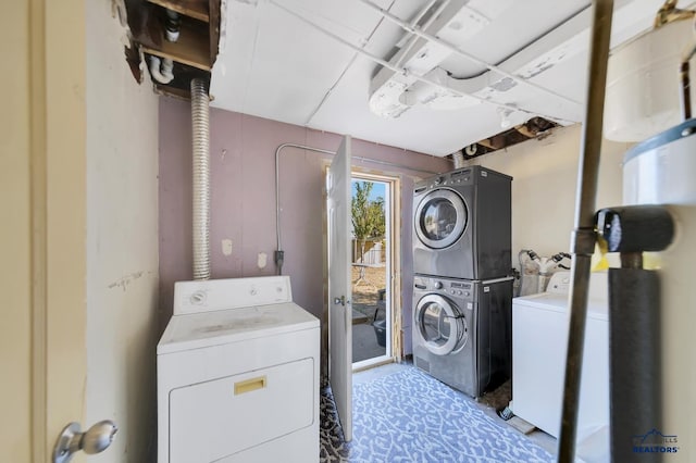 1922 Ivy Ave, Rapid City, SD 57701 - laundry area with stacked washer / drying machine and washer and clothes dryer