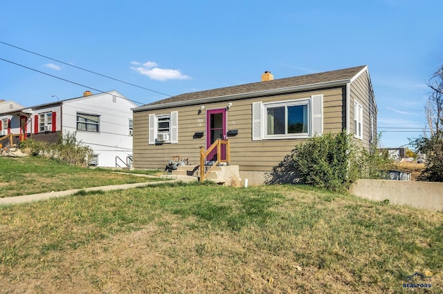 1922 Ivy Ave, Rapid City, SD 57701 - view of front of house featuring a front yard