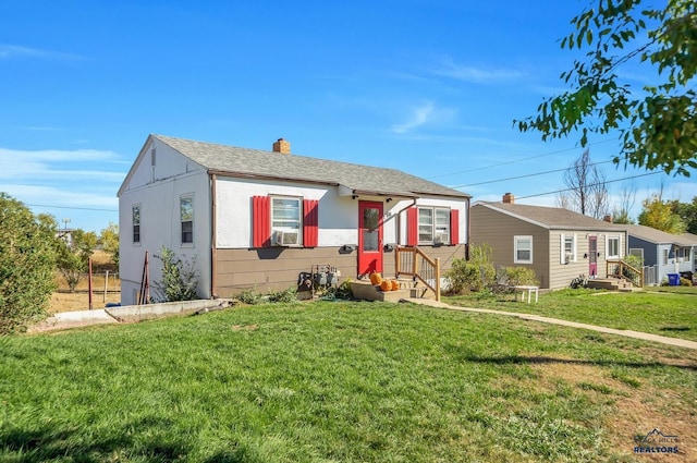 1918 Ivy Ave, Rapid City, SD 57701 - view of front facade with a front lawn