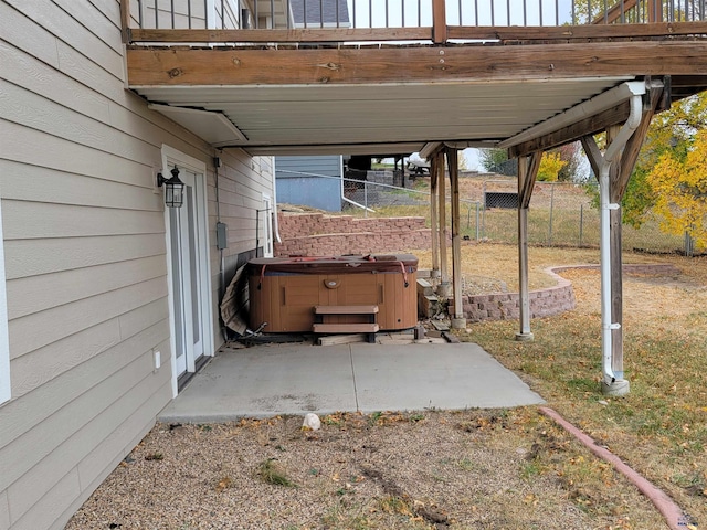 view of patio / terrace featuring a hot tub