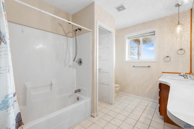 full bathroom featuring vanity, shower / bath combo, toilet, and tile patterned flooring